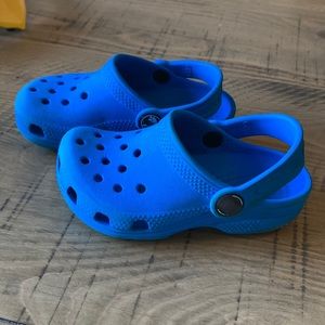 Blue crocs, size 8